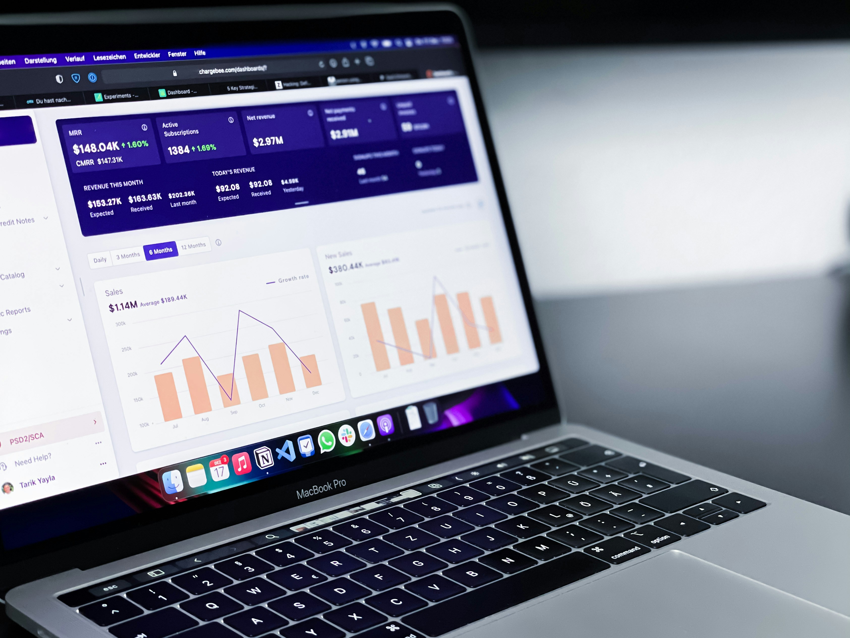 Small business owner reviewing marketing analytics on a laptop